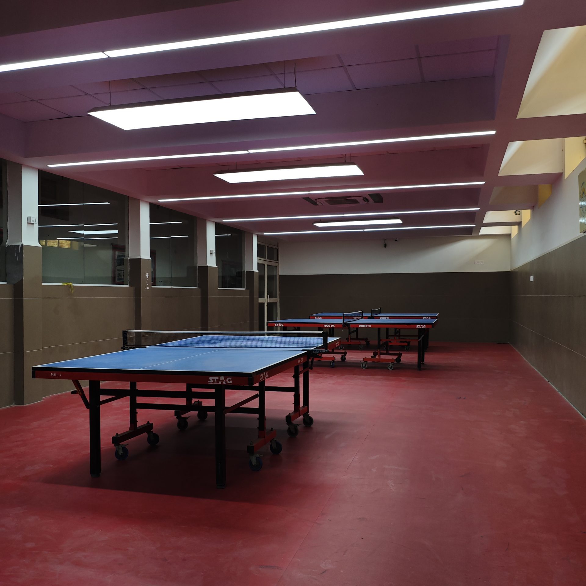 The school has a big table tennis arena in it’s basement with 5 tables.